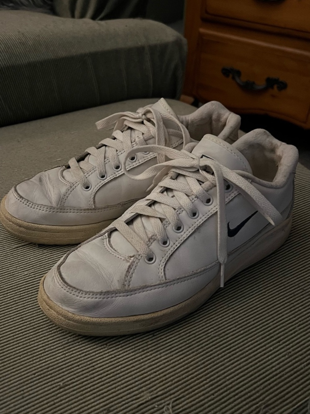 Nike White Low-Top Sneakers with Black Swoosh